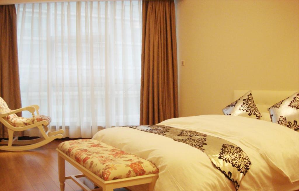 Hangzhou Yilin Hotel Apartment Oda fotoğraf